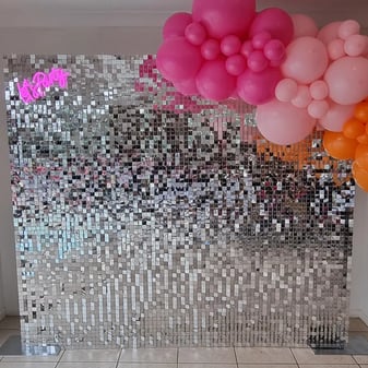 Silver shimmer wall and balloon garland for Nadia's hens party in the Gold Coast.