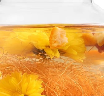 a glass teapot with a glass teapot and a glass teapot