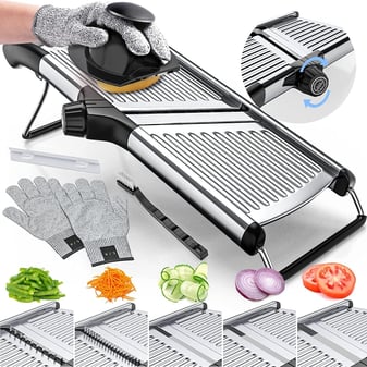 a person is using a mandolin slicer