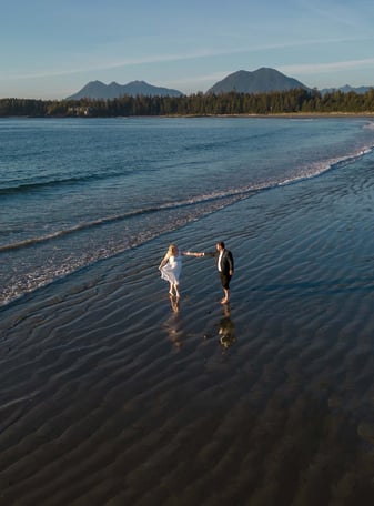 Tofino Elopement photographer photographing a couple eloping on a beach in Tofino 