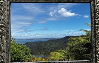 the beautiful framed view of the waitakere ranges regional park