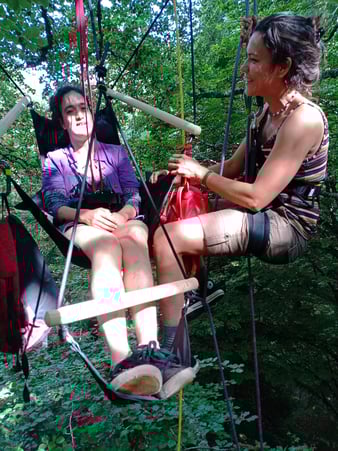 Suspended chair with disabled person inside