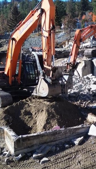 two excavators digging