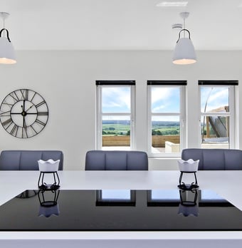 Modern kitchen design with integrated appliances and a spacious island.
