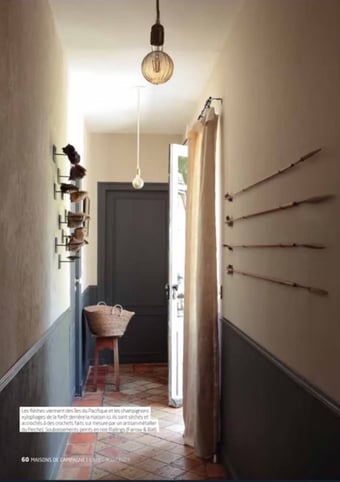 a hallway with a chair and a table, interior design, normandy cottage, vintage decor