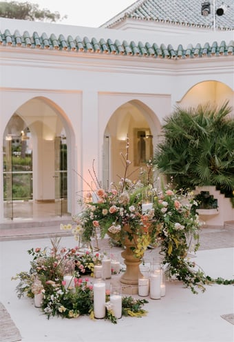 Outdoor dining area at Villa El Rincon in Marbella, with beautiful decorations for a Mediterranean destination wedding.