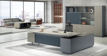 Contemporary executive office from the Mush Series featuring a modern L-shaped desk with soft grey a