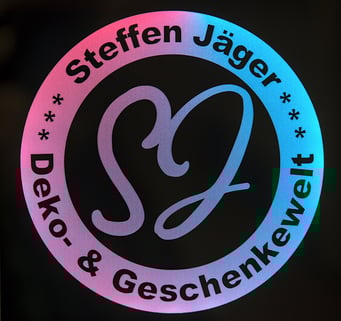 das Logo dieser Webseite, mit verschiedenen Blau und Rottönen vermischt