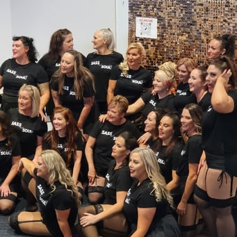 The Sass and Soul team in front of the SweetAz Co. rose gold shimmer wall hire at HOTA, Gold Coast