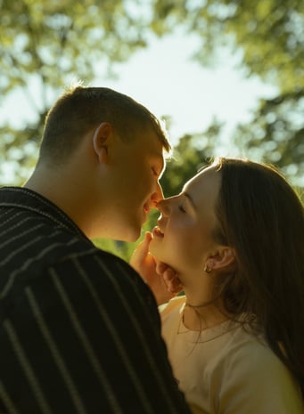 a man and woman are looking at each other