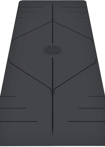 a yoga mat with a black and white mat