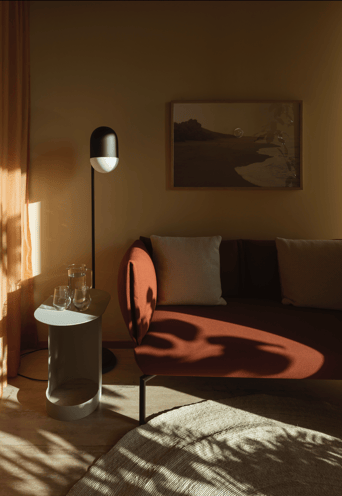 Warm, cozy consultation or lounge room with soft lighting and minimalist decor.