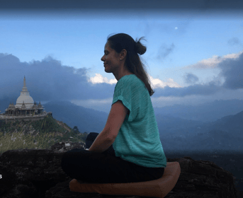 A lady is meditating at Mahamevunawa Asapuwa in Nuwara Eliya