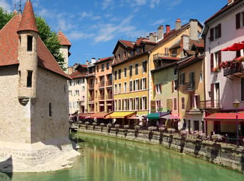 A relaxing view of the canal and cute coffee shops in Annecy, France