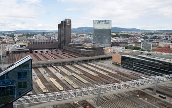 a train station with a train on the tracks