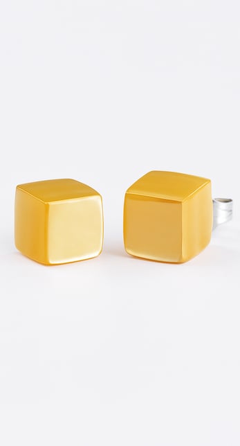 a pair of earrings with a gold plated earring