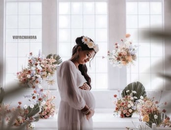 Pregnant mother glowing in maternity shoot at Vidaychandra Photostudio.