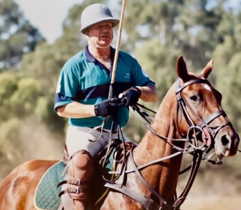 Laurie Connell playing polo at King's Meadow by Peter Pickering