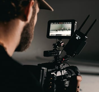 Videographer filming creative production project at Braske Agency
