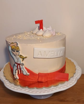 a cake with a cake topperf on it