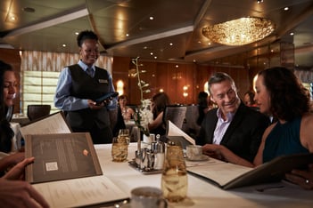 a waiter and waitress in a restaurant