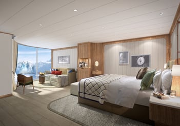a bedroom with a bed and a couch
