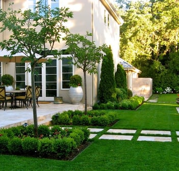 Drought-tolerant landscaping design with native plants for hillside property in Orinda