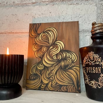 a candle with a candle and a candle on a table