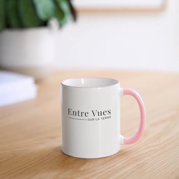 a mug of coffee mug with a pink mug