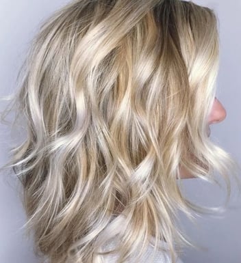 woman with blonde wavy hair