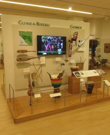 a museum display showing instruments from guinea-bissau and guinea