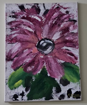 a painting of a flower on a white wall