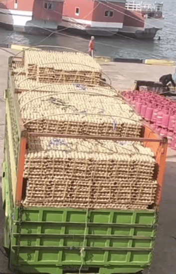 a truck with table egg on it
