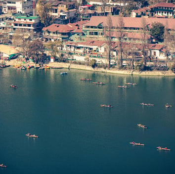 a group of people in canoes in the water