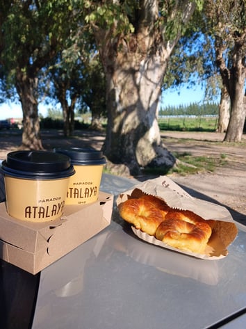 a cup of coffee and a cup of coffee on a table
