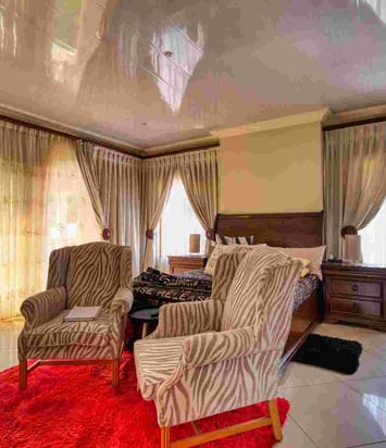 Expert installing custom drapes for luxury home decor