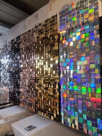 Shimmer wall panels hanging in the SweetAz Co. workshop in Redlands. Black, Gold, Rose Gold, Silver and Irirdescent.