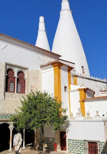 Tall white chimneys of Sintra National Palace