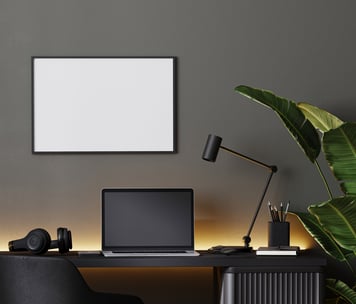 modern office space with white board and lap top 