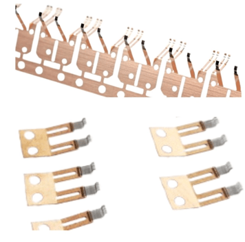 a group of metal parts of a set of four different types of electrical components
