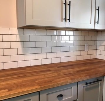 a kitchen counter top with a wooden counter top