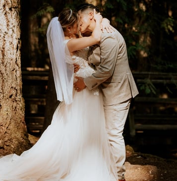 gibson wedding photography ceremony kissing LGBTQ couple