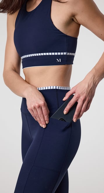 Fashion e-commerce photography - a woman in a sports bra top and leggings