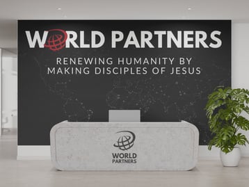 promotional materials for World Partners, designed by Brennan Doud