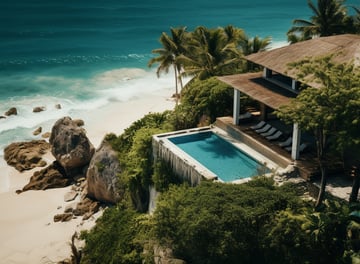 a house with a pool and a beach