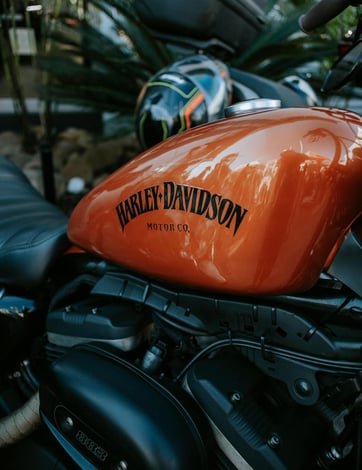Orange Harley Davidson Fuel Tank with Black Logo at ProPolish