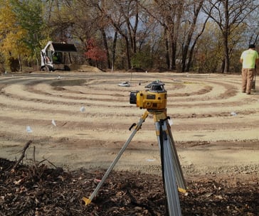 a man standing in a circular maze maze maze