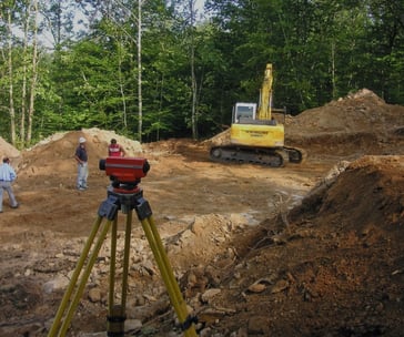 a man standing in front of a construction site