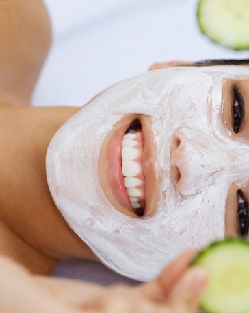 a woman with a face mask on her face