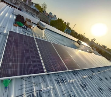 a solar paneled roof with solar panels on a roof